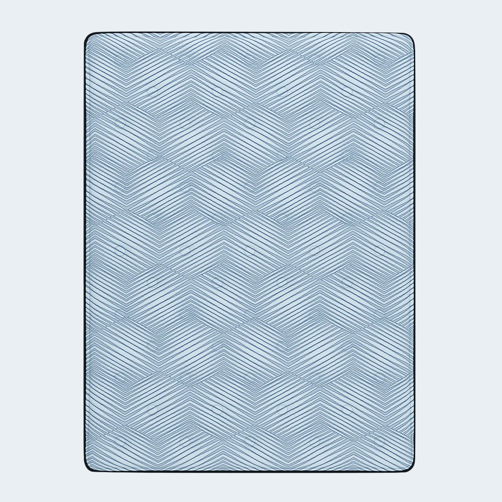 Overhead top-down view of the Peak 2.0 mattress surface featuring a breathable blue and white geometric cooling pattern.
