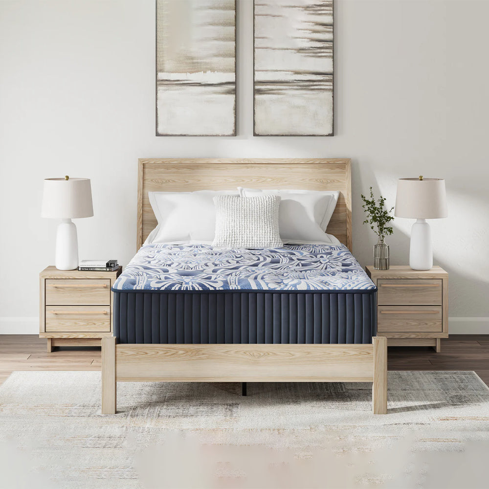 Frontal view of the Ashley Furniture Luxe 2.0 Blue mattress featuring a luxury 15-inch profile and breathable cooling performance fabric.
