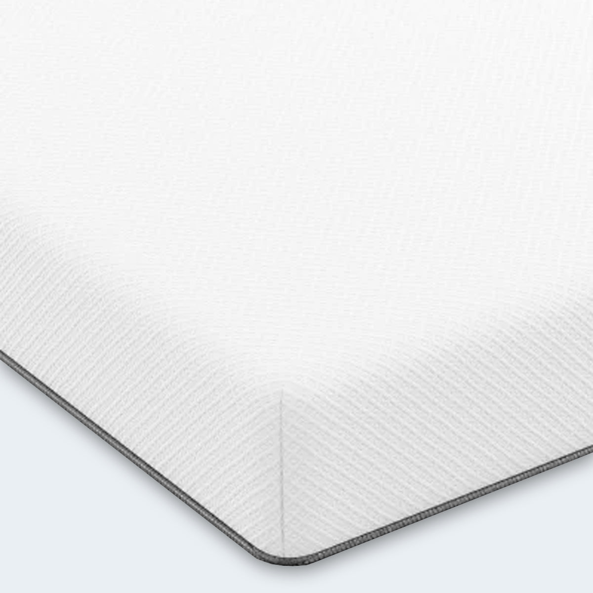 Close-up of the quilted cover on the Ease Medium Gel Memory Mattress highlighting the white moisture-wicking fabric.