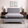 Front view of the Polaris 12" Activair Hybrid Mattress in a luxurious bedroom setting with a grey bed frame.