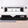 Side detail of the Venus Williams Legend Hybrid Mattress brand tag on the textured cooling fabric for better sleep.