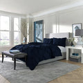 Deep navy blue SleepTone Tranquility pinch pleat comforter set for a sophisticated, cozy bedroom.
