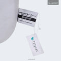 Malouf Sleep Tite Omniphase mattress protector tag highlighting breathable Tencel fiber technology.
