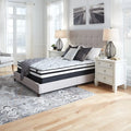 Chime Innerspring 8 inch firm mattress styled in a luxury bedroom with modern nightstands.