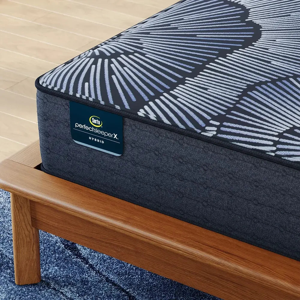 Detail of the cooling smooth top fabric on the Serta Perfect Sleeper X Aspen Firm Hybrid Mattress.
