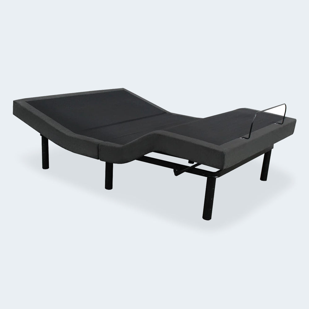Low-angle perspective of the iDealBed Smart 6i custom adjustable bed showing head and foot articulation.

