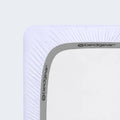 White Hyper-Wool crib sheet featuring a grey Powerband elastic for a safe and secure mattress fit.
