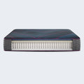 Close-up of the premium cooling fabric on a Beautyrest World Class Hybrid Level Three Medium mattress.
