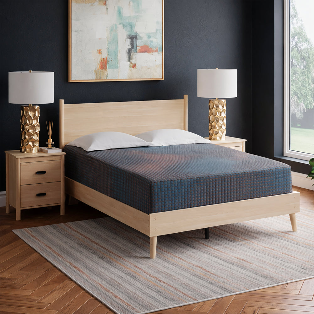 Contemporary bedroom interior featuring the Ashley Hot Buy 13-inch hybrid mattress, designed for superior back support and pressure relief.
