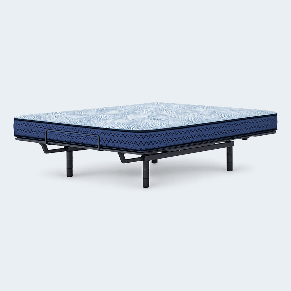 Ashley Peak 2.0 8-inch mattress shown flexing on an adjustable power base to demonstrate flexibility and comfort.