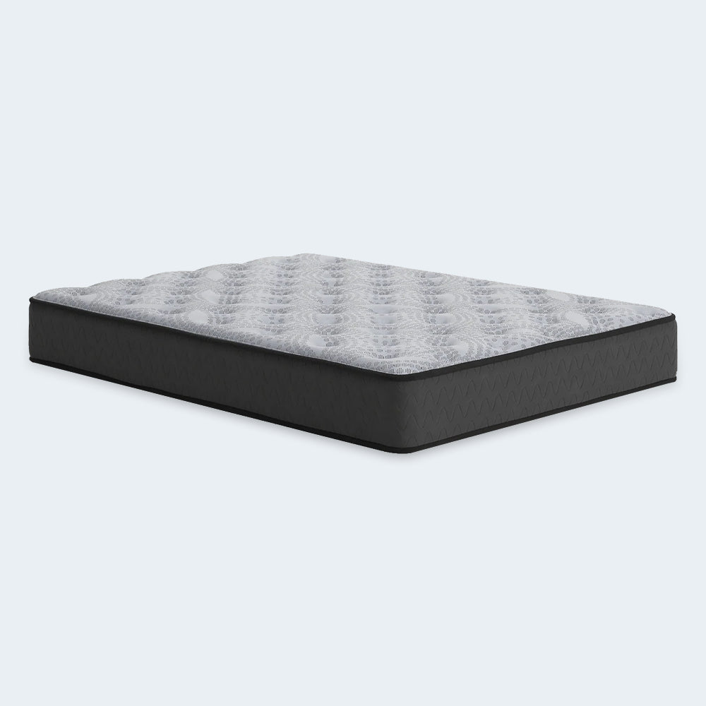 Side angle view of the 10-inch Comfort Plus medium mattress highlighting its durable construction and motion-reducing foam layers.