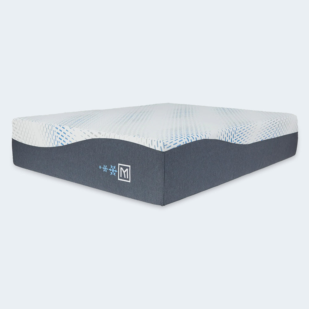 Perspective view of the 12-inch Millennium Luxury Gel Memory Foam Mattress by Ashley Sleep featuring a cooling geometric cover and dark grey side panels.
