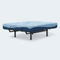 Peak 2.0 8-inch Memory Foam Mattress by Ashley shown on a raised adjustable base for personalized comfort and targeted pressure relief.
