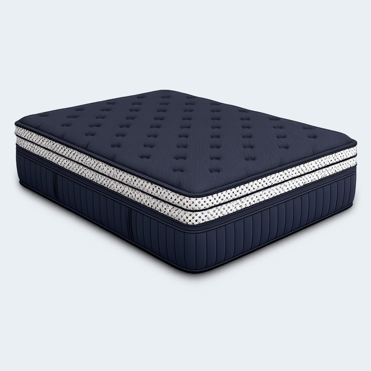 Side angle of the 17'' mattress showcasing the navy double box top and signature white polka dot gusset border.
