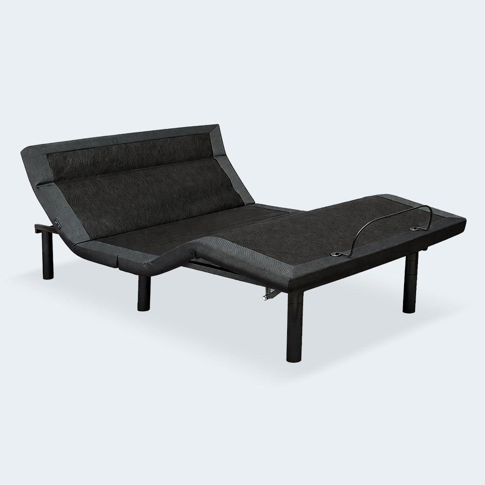 Perspective view of the Customatic Dreamsense The Balance adjustable bed frame in a contoured ergonomic lounging position.
