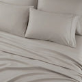 Close-up of champagne BEDGEAR Hyper-Cotton pillowcases and soft, moisture-wicking sheets.
