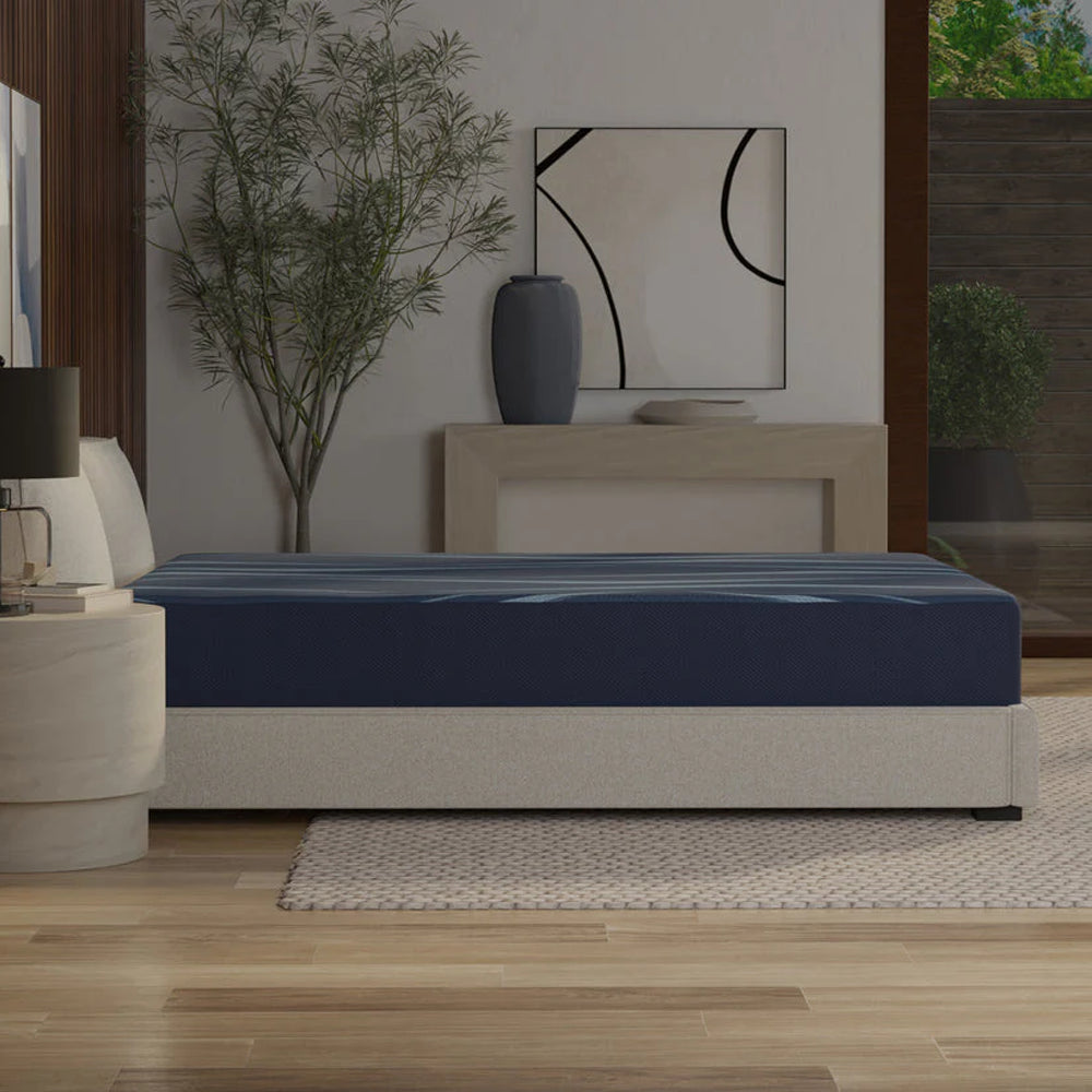 Low-profile side view of the Active Align mattress highlighting its sleek 10-inch depth and supportive foam construction in a designer bedroom.
