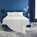 All-white Ver-Tex sheets by BEDGEAR on a platform bed in a modern blue-walled bedroom.
