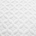 Quilted IceTech cooling fabric on a Malouf HyperChill pillow protector for temperature control.
