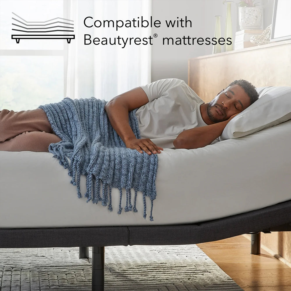 Man sleeping on a Baselogic Platinum Adjustable Base, highlighted for its compatibility with Beautyrest mattresses and luxury sleep systems.
