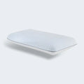 Perspective view of the Malouf Bamboo Charcoal memory foam pillow featuring a white performance cooling cover.
