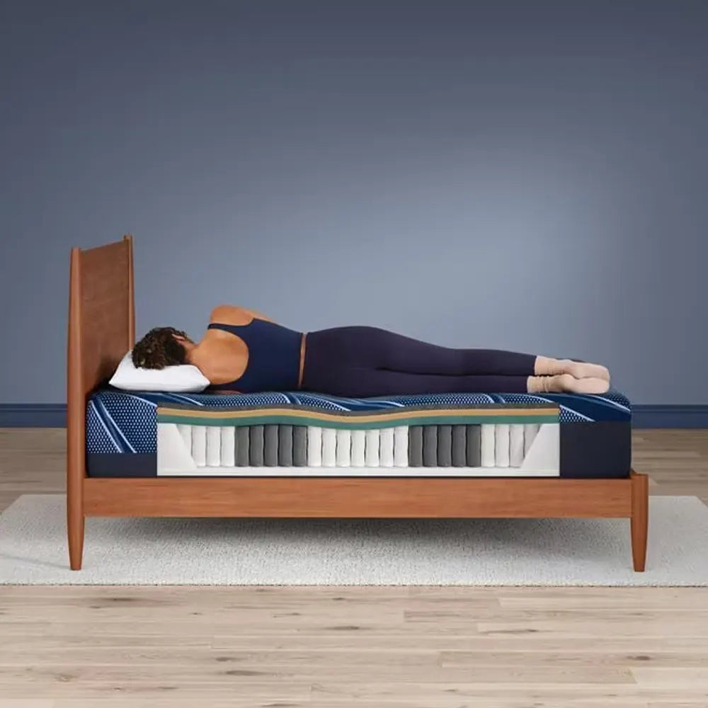 Spinal alignment diagram showing Serta iSeries NXG 2500 hybrid layers supporting a side sleeper.
