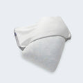 Removable and washable IceTone cooling cover shown being taken off a Sleeptone memory foam pillow.

