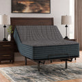 Gray 1200 Hybrid mattress by Ashley with the head section fully raised on a power base for reading or watching TV in a modern bedroom.
