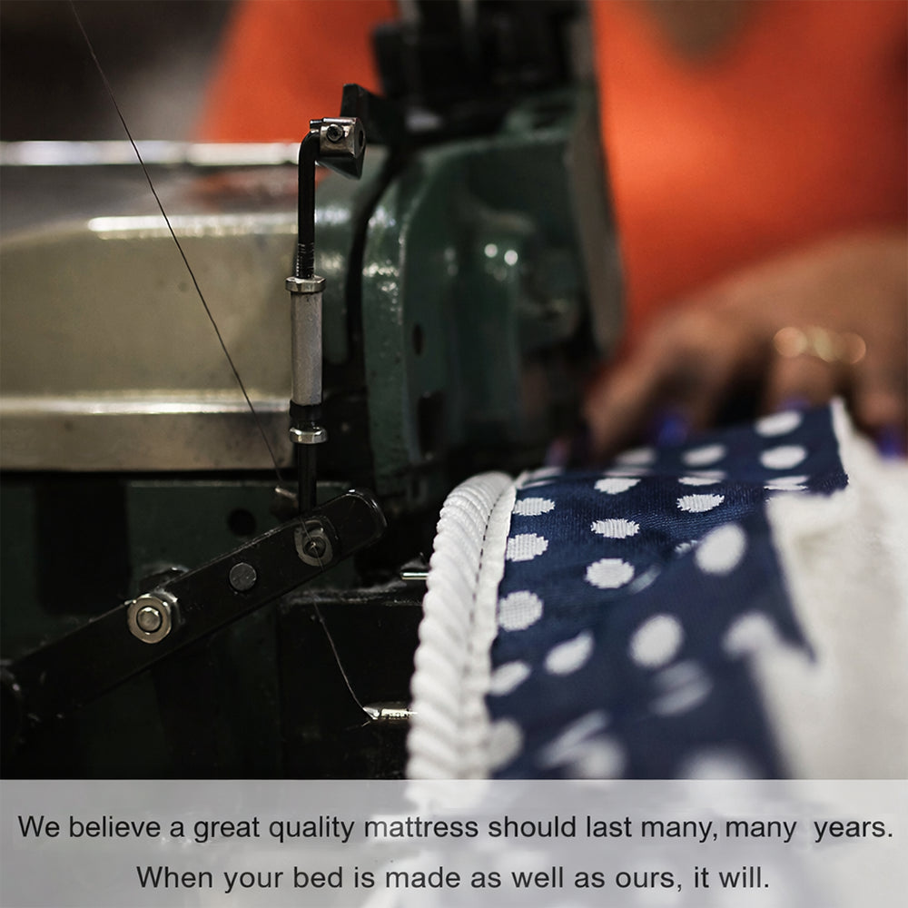 Skilled industrial sewing process of the navy blue ribbon trim on a WinkBed, illustrating high-quality USA-made construction.

