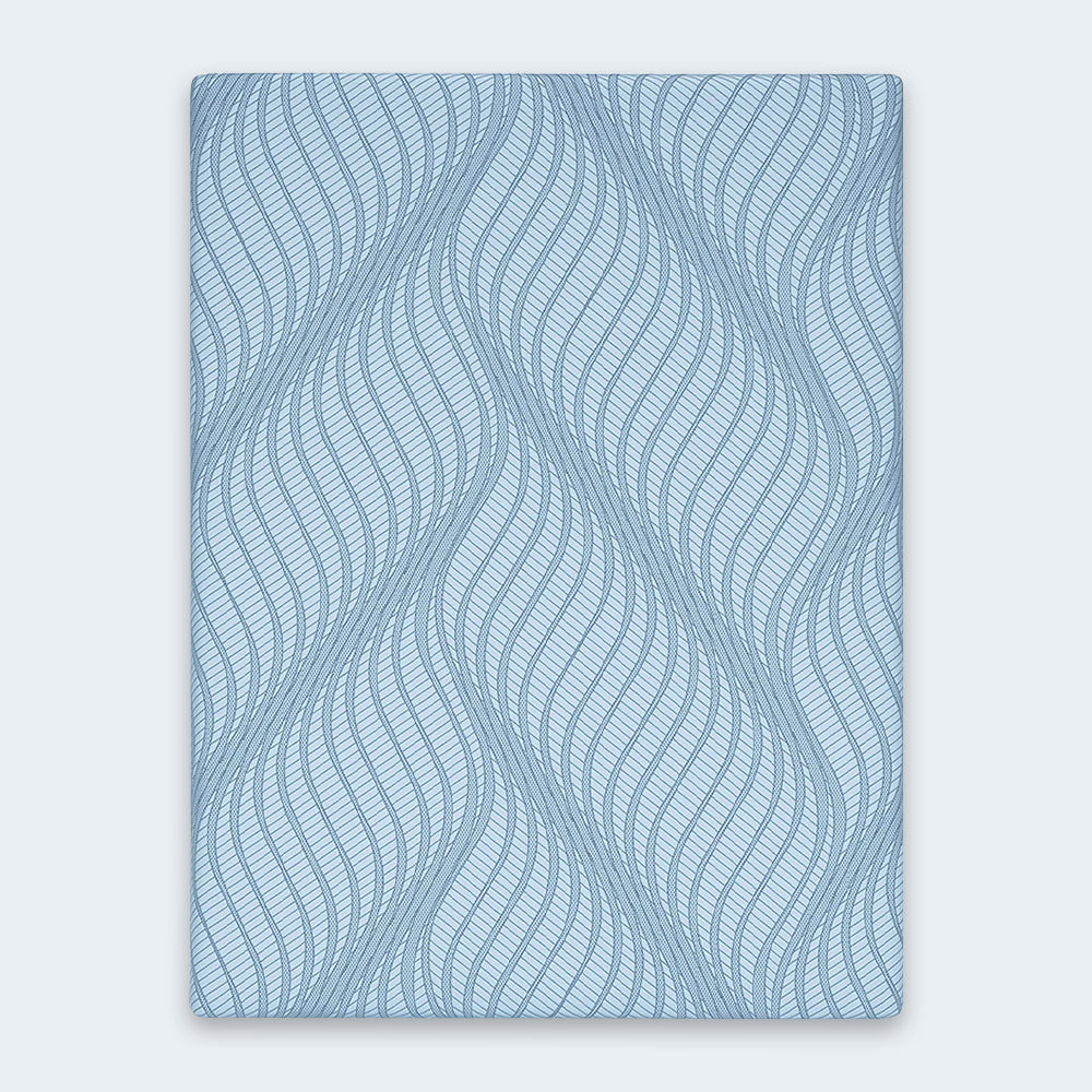 Overhead top-down view of the Peak 2.0 10-inch mattress surface featuring a signature light blue wave textured stretch-knit cooling cover.
