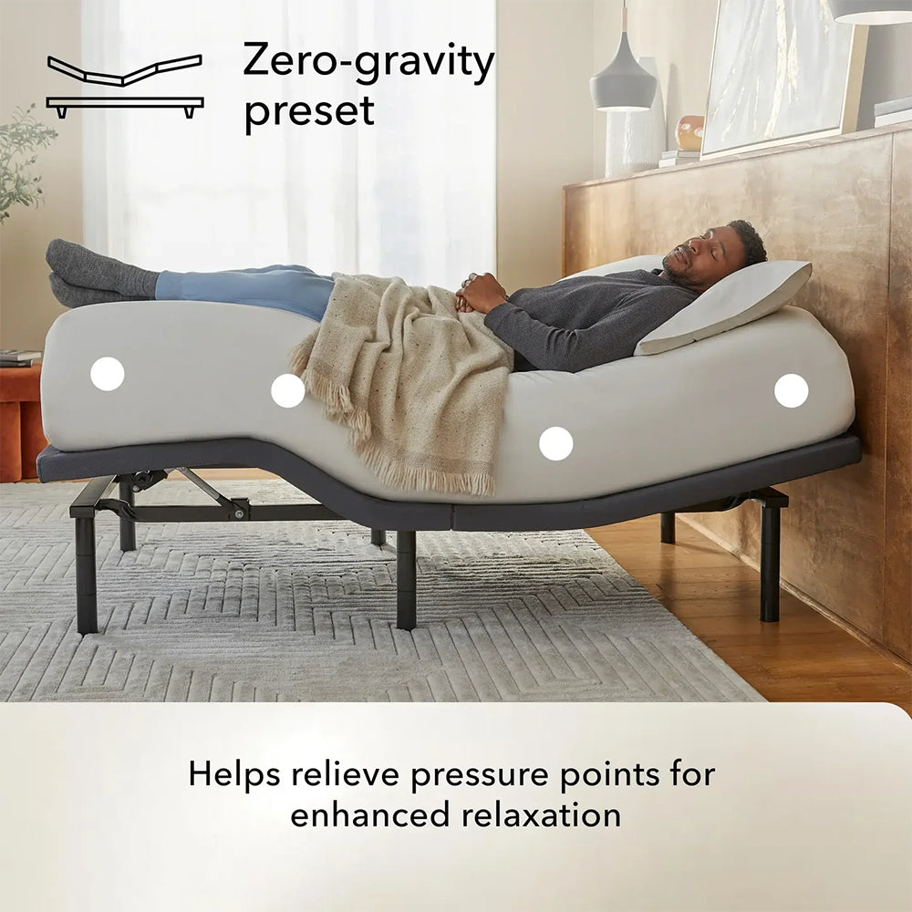 Man relaxing in the zero-gravity preset on a baselogic™ Pearl Adjustable Base to relieve pressure points and enhance total body relaxation.
