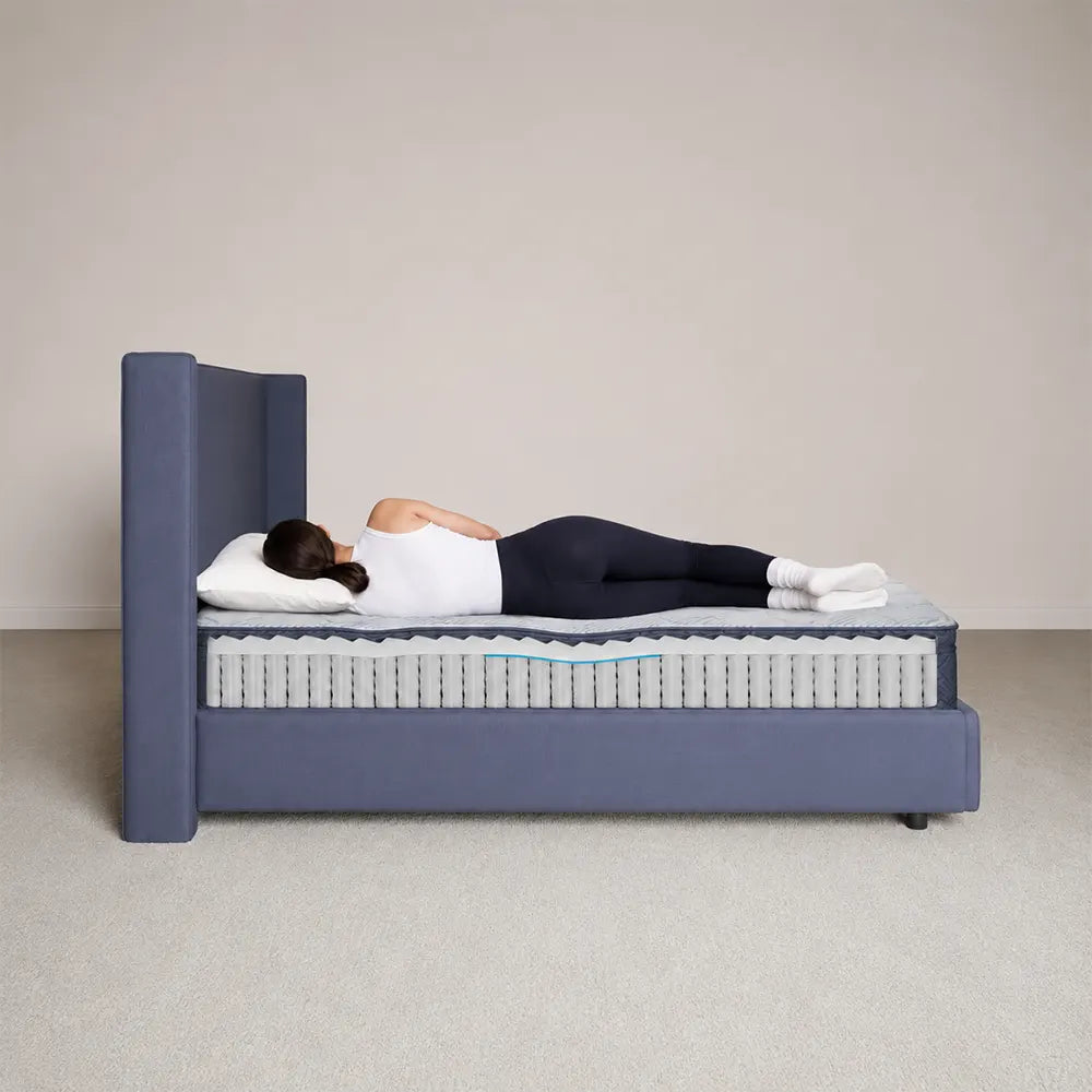 Side sleeper showing healthy spinal alignment on the Serta Perfect Day 10 inch plush pillow top mattress.

