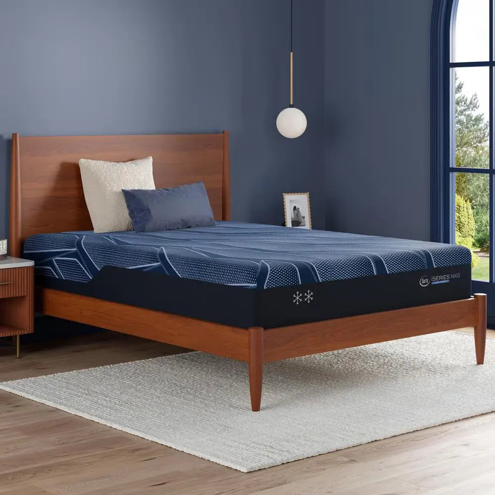 Supportive Serta iSeries NXG 2500 Hybrid Plush mattress styled in a contemporary master bedroom.