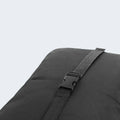 Detailed view of the durable plastic buckle on the BEDGEAR travel pillow case for securing to luggage handles.
