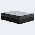 Perspective studio shot of the Comfort Plus 10-inch mattress featuring a grey quilted top and charcoal side panels with a wavy stitch pattern.
