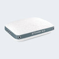 Side sleeper woman resting on a BEDGEAR Storm performance pillow for proper neck and spine alignment.
