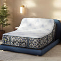 Serta Cascade Bluff Hybrid Firm mattress shown on an adjustable base for custom ergonomic sleep positions.
