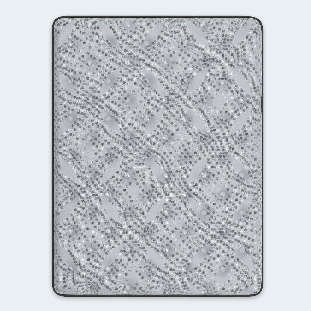 Top-down view of the Comfort Plus 10 Inch Medium Mattress showing the breathable quilted knit surface and cooling fabric texture.
