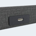 Side-mounted USB charging port on the Independence bed upholstery for convenient device power access.
