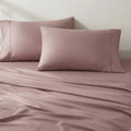 Detailed view of mauve BEDGEAR Hyper-Cotton pillowcases and smooth, breathable sheets.
