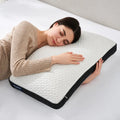 Relaxed woman sleeping on a Sleeptone cooling gel memory foam pillow, providing pressure-relieving rest.
