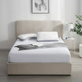 Sleeptone IceTone shoulder cutout pillow on a bed, specifically designed for side sleeper alignment.
