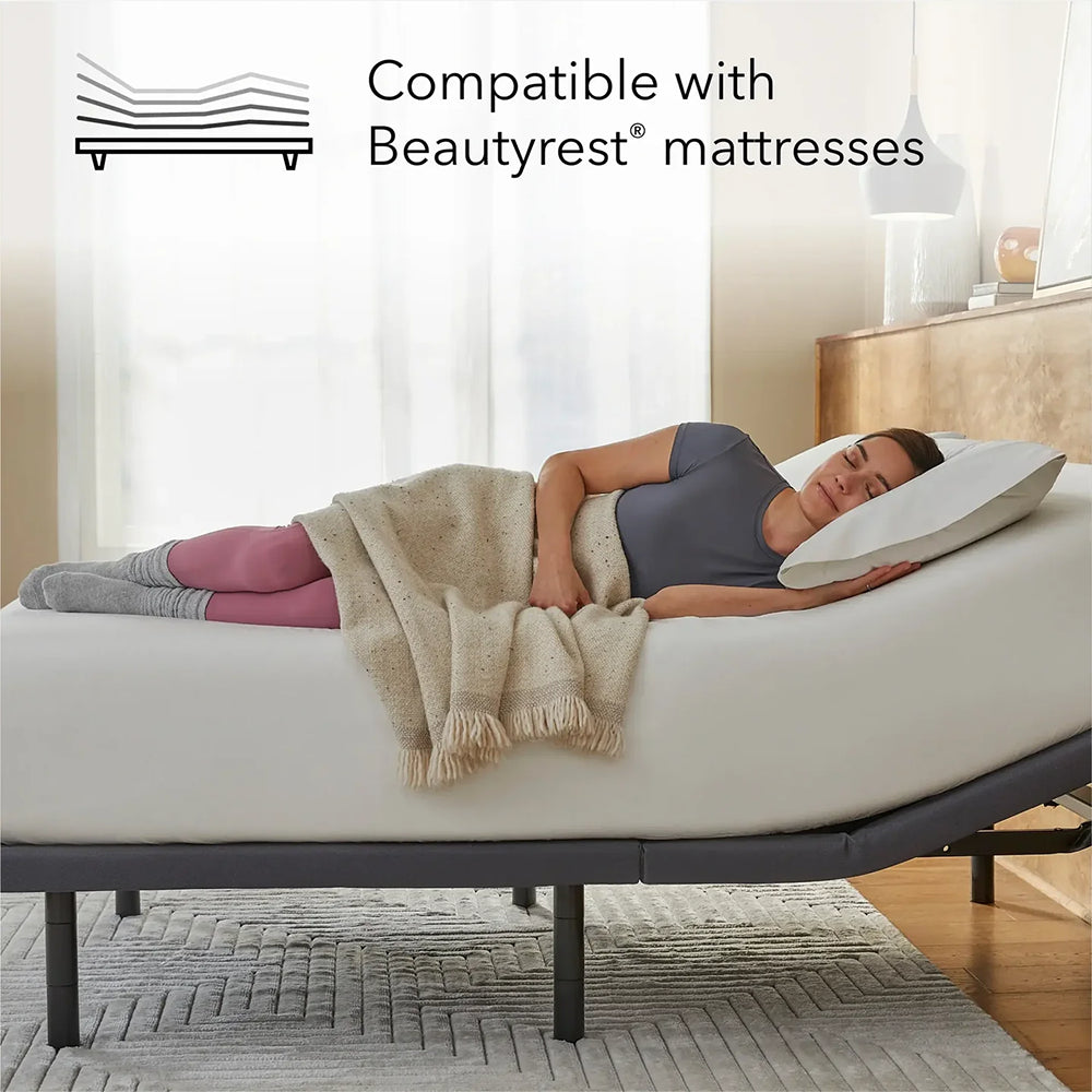 Woman sleeping on a baselogic™ Pearl Adjustable Base, demonstrating its seamless compatibility with Beautyrest mattresses.
