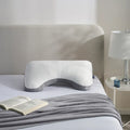 Standard and shoulder cutout Sleeptone IceTone cooling pillows on a bed for customizable comfort.
