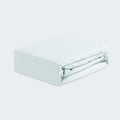 Mint green BEDGEAR Dri-Tec performance crib sheet, moisture-wicking for a temperature-neutral nursery.
