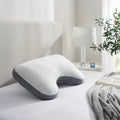 Sleeptone IceTone contoured shoulder cutout pillow for orthopedic neck support and cooling sleep.
