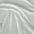 Macro texture of sage green Hyper-Wool performance fabric for maximum moisture-wicking and comfort.
